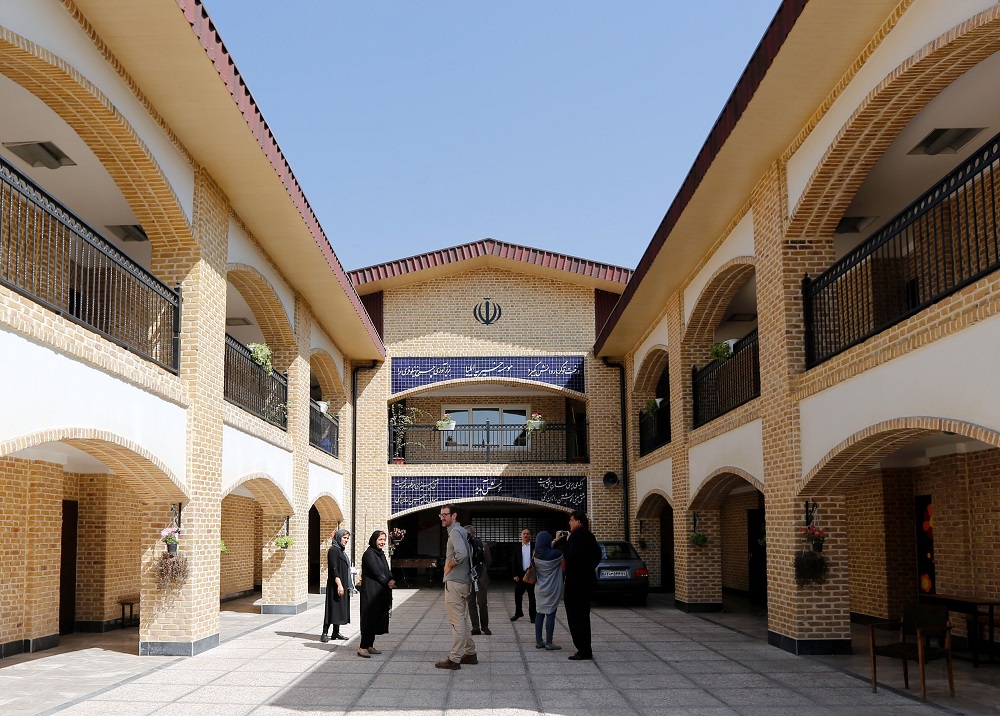 People stand at the ILIA charity complex that caters to hundreds of struggling families and Afghan refugees in the Iranian capital of Tehran September, 11, 2018. u00e2u20acu201d AFP pic  