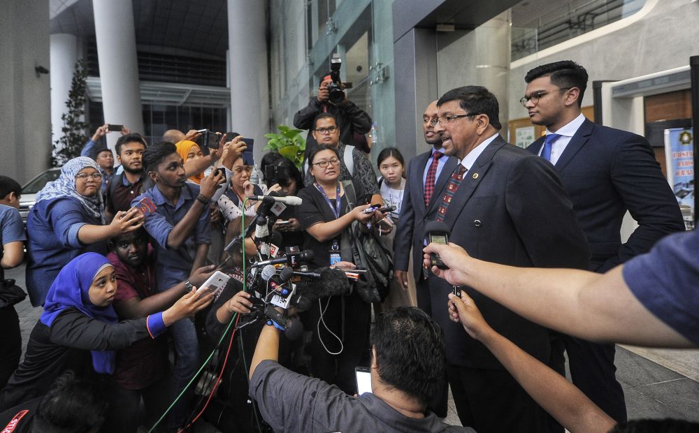Datin Seri Rosmah Mansor's lawyers speak to reporters at the entrance of the MACCu00e2u20acu2122s headquarters in Putrajaya October 3, 2018. u00e2u20acu201d Picture by Shafwan Zaidon