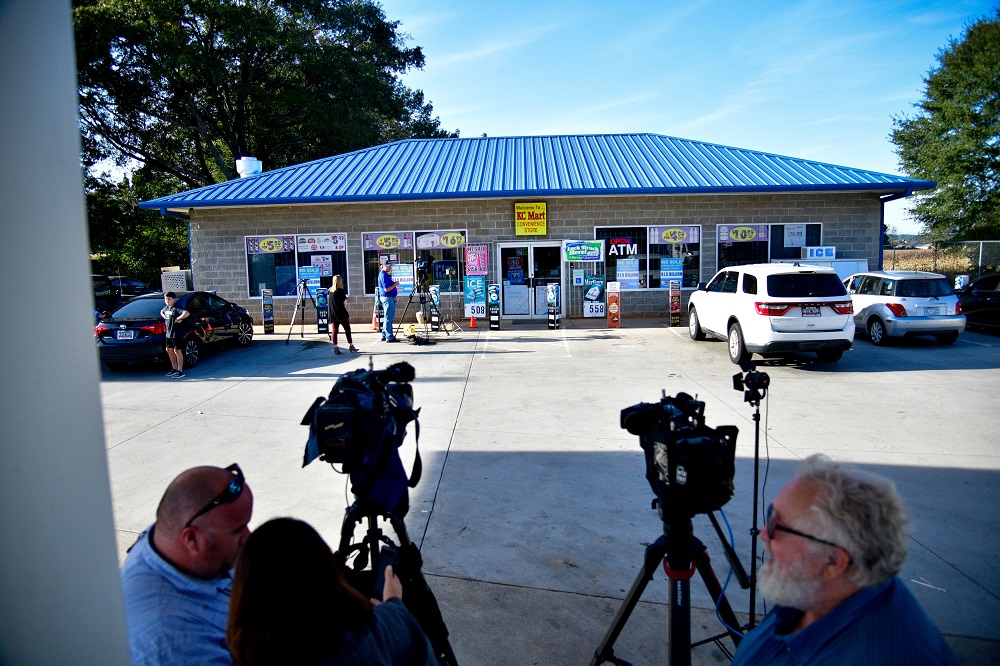 TV crews wait around outside the KC Mart in Simpsonville, South Carolina, October 24, 2018. u00e2u20acu201d Reuters pic