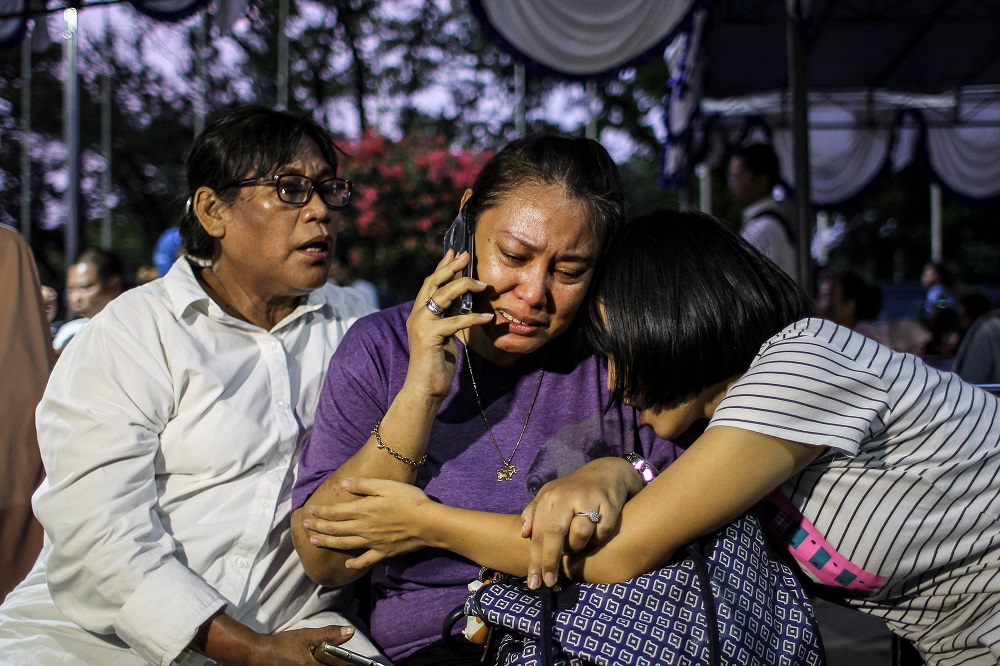 Relatives of passengers on Lion Air flight JT610, that crashed into the sea, cry as they wait at Halim Perdanakusuma International Airport in Jakarta, Indonesia, October 29, 2018. u00e2u20acu201d Antara Foto/Dhemas Reviyanto via Reuters pic