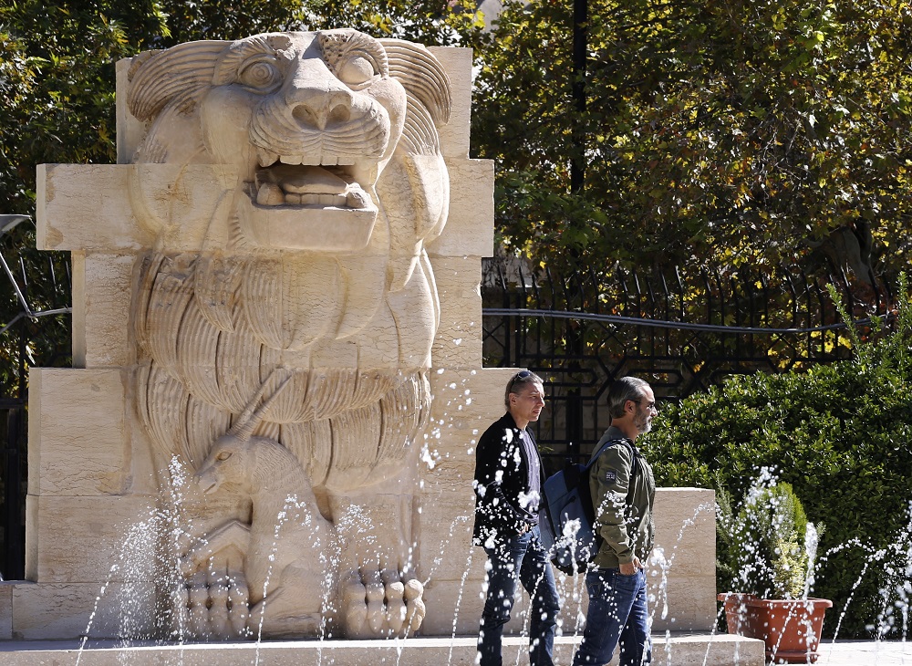 Visitors walk in front of the Lion of al-Lat, an ancient statue from the temple of the same name in Palmyra, during their visit to the national antiquities museum in the Syrian capital Damascus on October 28, 2018. u00e2u20acu201d AFP pic