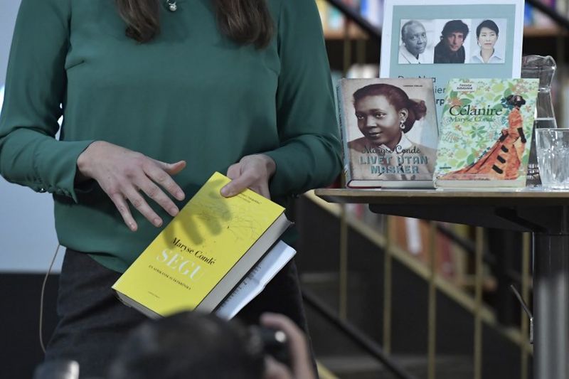 Books of Guadeloupian writer Maryse Conde are on display at the announcement of the laureate of The New Academy Prize in Literature at Stockholm City Library, Stockholm on October 12, 2018. u00e2u20acu201d AFP pic