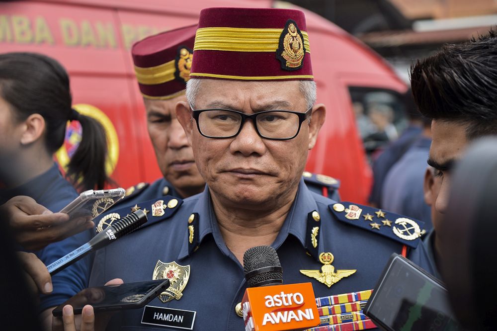Mohammad Hamdan said the six had followed the standard operating procedure and were not derelict in their duties. u00e2u20acu2022 Picture by Mukhriz Hazim