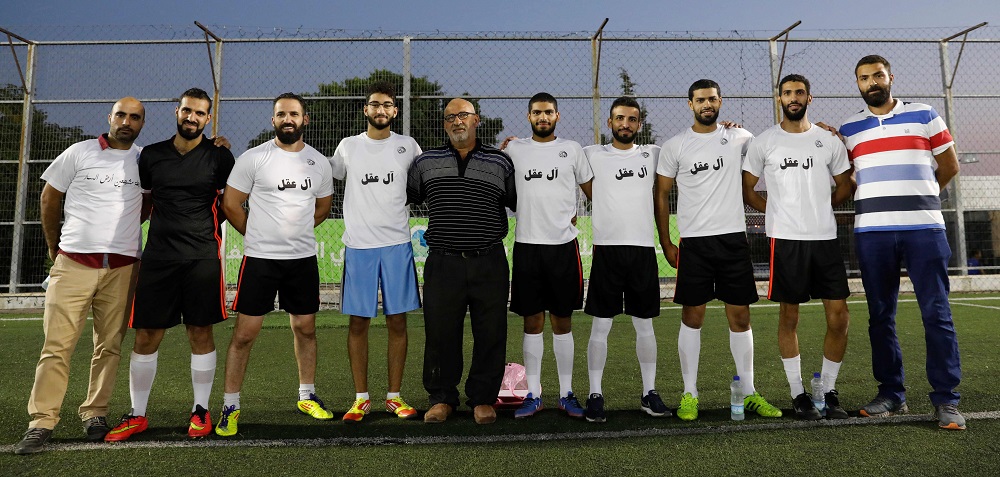 Members of the Palestinian Aqal family team pose for a photo before a month-long football tournament in which the largest Palestinian families play each other in the Burj Luqluq part of Jerusalemu00e2u20acu2122s Old City on September 17, 2018. u00e2u20acu201d AFP pic  