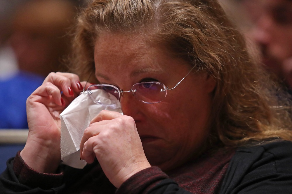 A woman reacts during a memorial service at the Sailors and Soldiers Hall of the University of Pittsburgh, a day after 11 worshippers were shot dead at a synagogue in Pittsburgh, Pennsylvania, October 28, 2018. u00e2u20acu201d Reuters pic