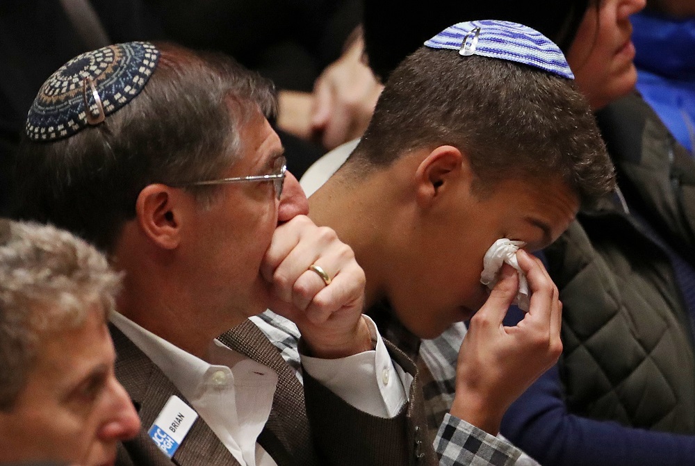 Mourners react during a memorial service at the Sailors and Soldiers Memorial Hall of the University of Pittsburgh, a day after 11 worshippers were shot dead at a Jewish synagogue in Pittsburgh, Pennsylvania, October 28, 2018. u00e2u20acu201d Reuters pic