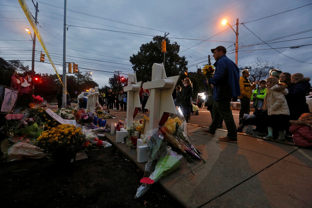 People pay their respects at a makeshift memorial outside the Tree of Life synagogue following Saturday's shooting at the synagogue in Pittsburgh, Pennsylvania, October 29, 2018. u00e2u20acu201d Reuters pic