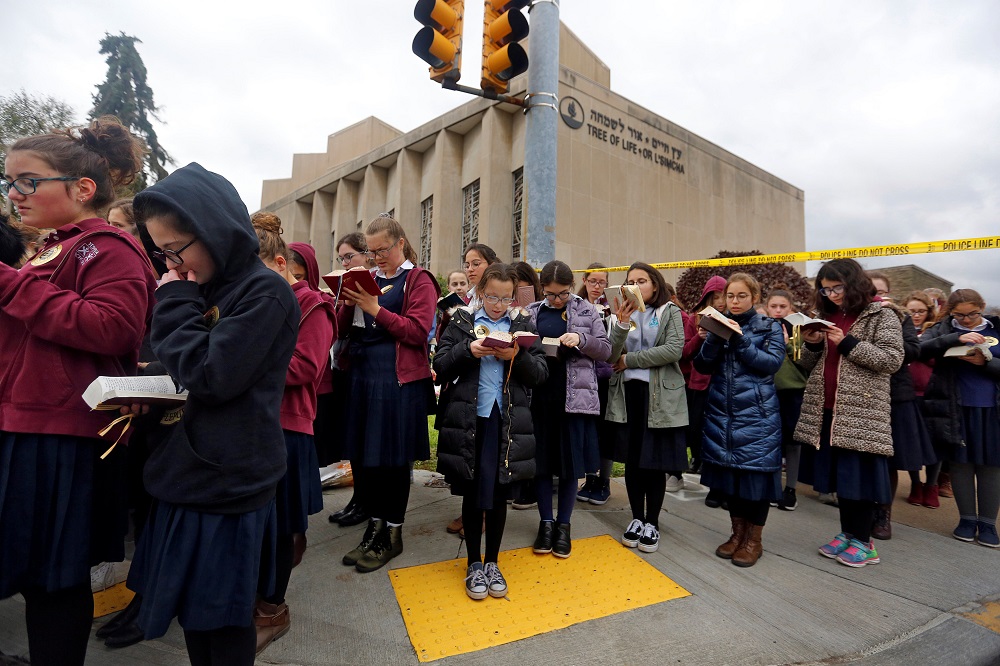 Pupils from the Yeshiva Girls School pray outside the Tree of Life synagogue following Saturday's shooting at the synagogue in Pittsburgh, Pennsylvania, October 29, 2018. u00e2u20acu201d Reuters pic 