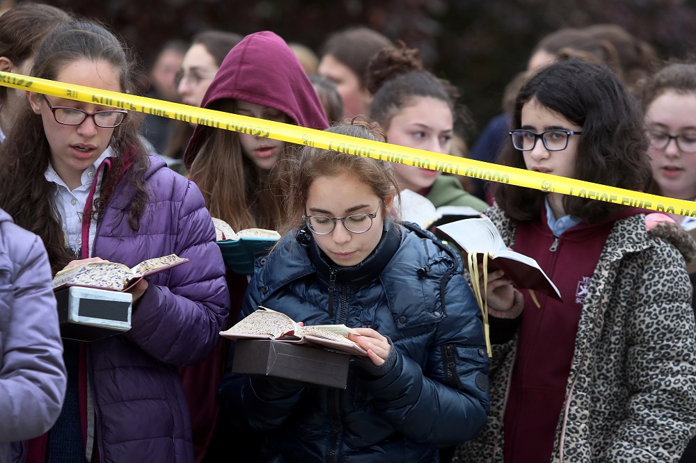 Pupils from the Yeshiva Girls School pray outside the Tree of Life synagogue following Saturday's shooting at the synagogue in Pittsburgh, Pennsylvania, October 29, 2018. u00e2u20acu201d Reuters pic 