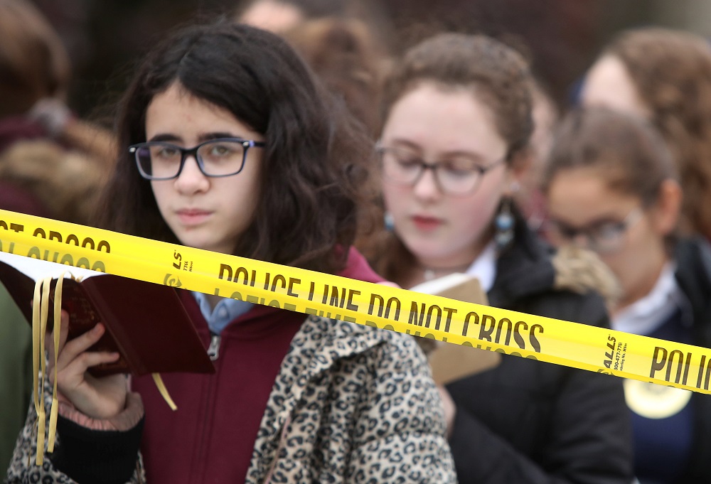 Pupils from the Yeshiva Girls School pray outside the Tree of Life synagogue following Saturday's shooting at the synagogue in Pittsburgh, Pennsylvania, October 29, 2018. u00e2u20acu201d Reuters pic 