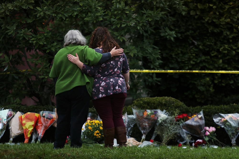 People visit an impromptu memorial at the Tree of Life synagogue following Saturday's shooting at the synagogue in Pittsburgh, Pennsylvania, October 28, 2018. u00e2u20acu201d Reuters pic