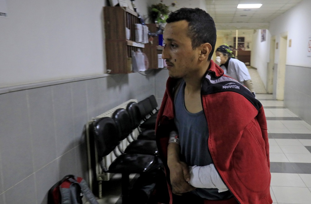 A Syrian young man who was injured by Turkish airstrike on his village arrives to receive treatment at the hospital in Afrin January 30, 2018. u00e2u20acu201d AFP pic  