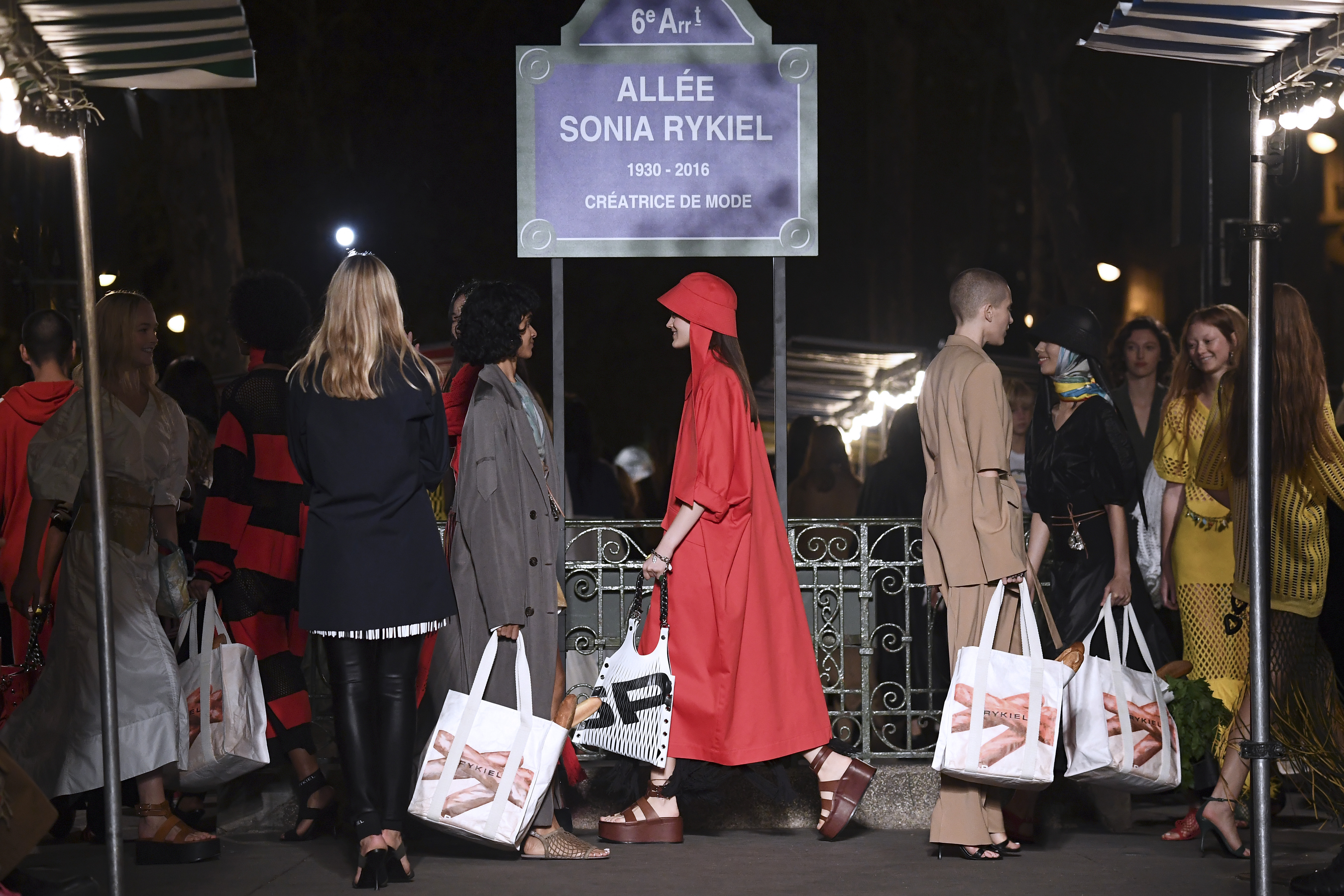 Models hold shopping bags at the end of the Sonia Rykiel Spring-Summer 2019 Ready-to-Wear collection fashion show in Paris, on September 29, 2018. u00e2u20acu201d AFP pic