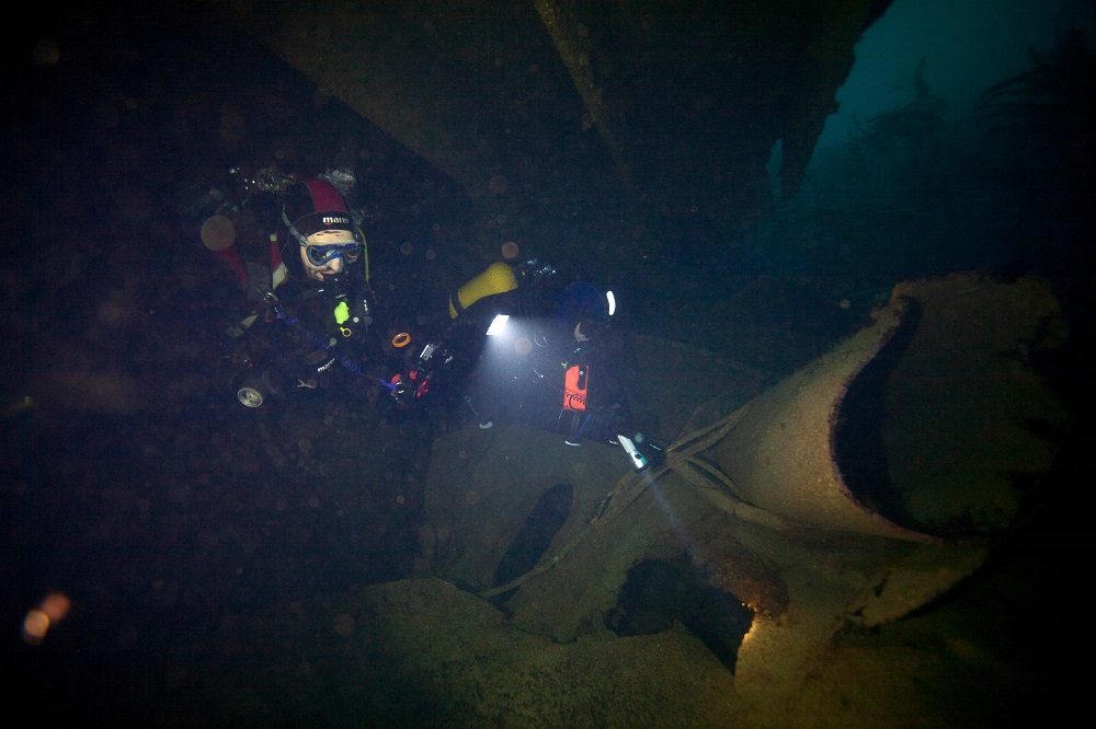 A diver explores the wreckage of the super tanker Amoco-Cadiz at 25 meters of depth, off the coast of Portsall, north-eastern France on October 5, 2018. — AFP pic