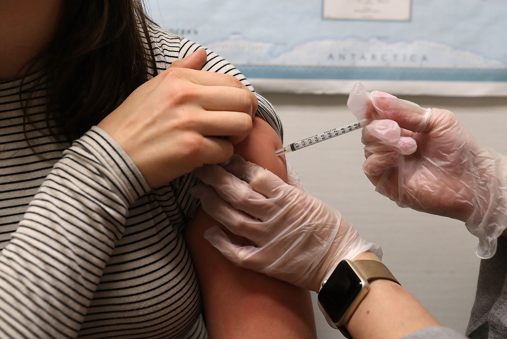 A woman receives a flu shot at a Walgreens pharmacy in San Francisco, California January 22, 2018. u00e2u20acu201d AFP pic  