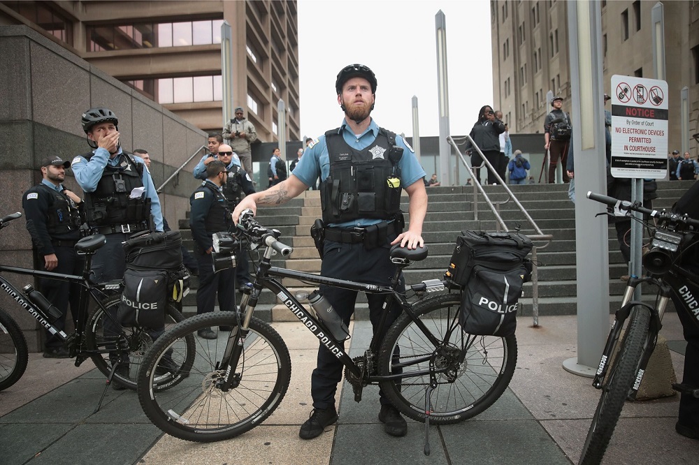 Police stand guard outside of the Leighton Criminal Courts Building as the verdict is about to be announced in the murder trial of Chicago police officer Jason Van Dyke in Chicago October 5, 2018. u00e2u20acu201d Reuters pic