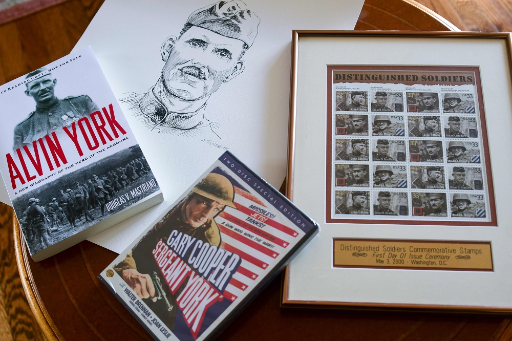 A book, a movie, a sketch and post stamps featuring Alvin York, a US sergeant in World War I, are on display on a table in Alexandria, Virginia October 2, 2018. u00e2u20acu201d AFP pic 