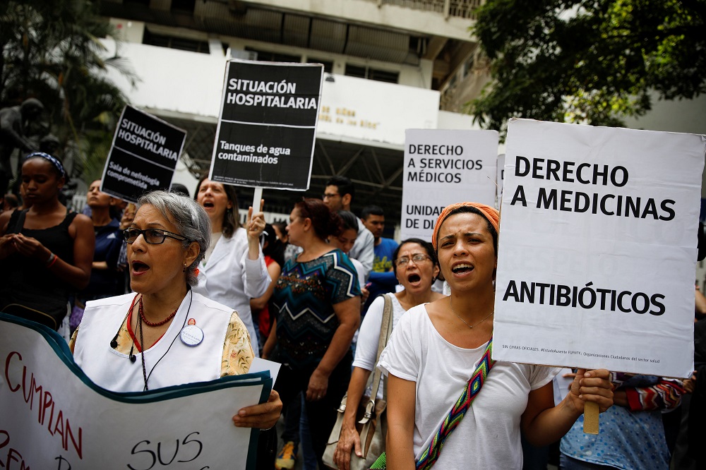 Workers of the health sector take part in a protest due to the shortages of basic medical supplies and for higher wages outside a children hospital in Caracas, Venezuela April 17, 2018. u00e2u20acu201d Reuters pic