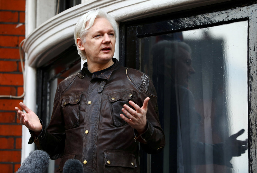 WikiLeaks founder Julian Assange is seen on the balcony of the Ecuadorian Embassy in London May 19, 2017.  u00e2u20acu201d Reuters pic