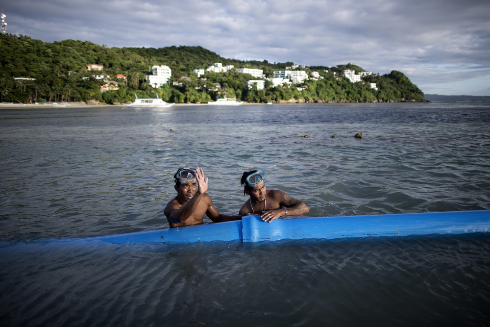 Workers install temporary drainage pipes at the Philippine island of Boracay October 26, 2018. u00e2u20acu201d AFP pic