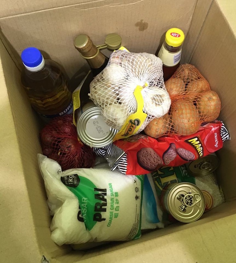 The food aid box comprises essential items for families. — Picture courtesy of Care United