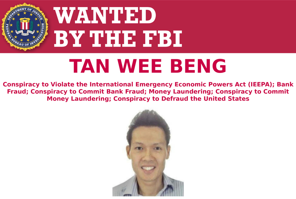 This 'Wanted Poster' obtained from the FBI on October 25, 2018, shows Singapore businessman Tan Wee Beng, 41. u00e2u20acu201d AFP pic