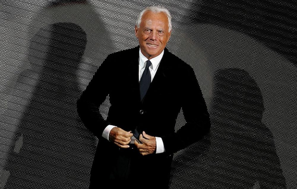 Italian designer Giorgio Armani acknowledges the applause at the end of his Fall/Winter 2006/2007 menu00e2u20acu2122s collection fashion show during Milan Fashion Week January 19, 2006. u00e2u20acu201d Max Rossi/Reuters pic