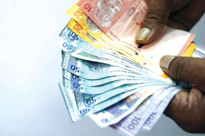 The initial capital typically needed to buy a home can be daunting. — MalayMail file pic