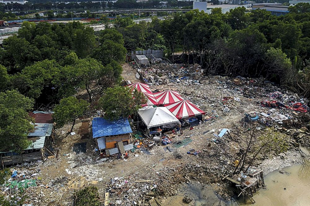 An aerial view of the illegal dumpsite in Seberang Jaya October 16, 2018. u00e2u20acu2022 Picture by Sayuti Zainuddin