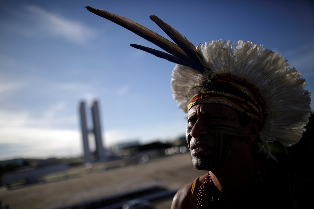 An indigenous man from the Pataxo tribe waits for a trial on the demarcation of indigenous lands, according to local media, in Brasilia, Brazil March 1, 2018.  u00e2u20acu201d Reuters pic