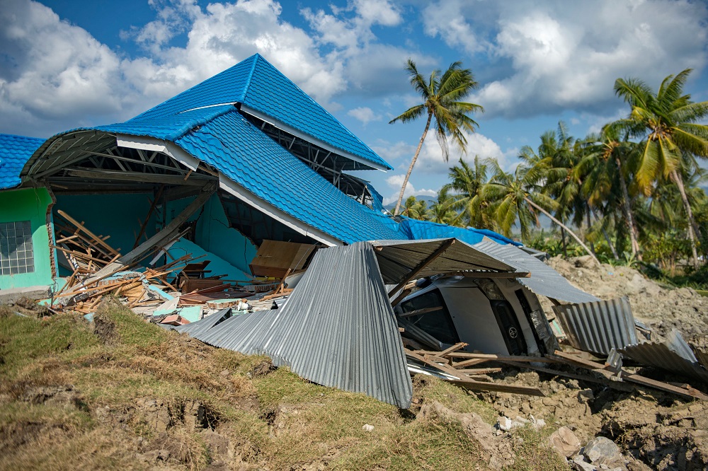 A boarding school that collapsed is seen in Petobo village near Palu, Indonesia's Central Sulawesi on October 1, 2018, after an earthquake and tsunami hit the area on September 28. u00e2u20acu201d AFP pic