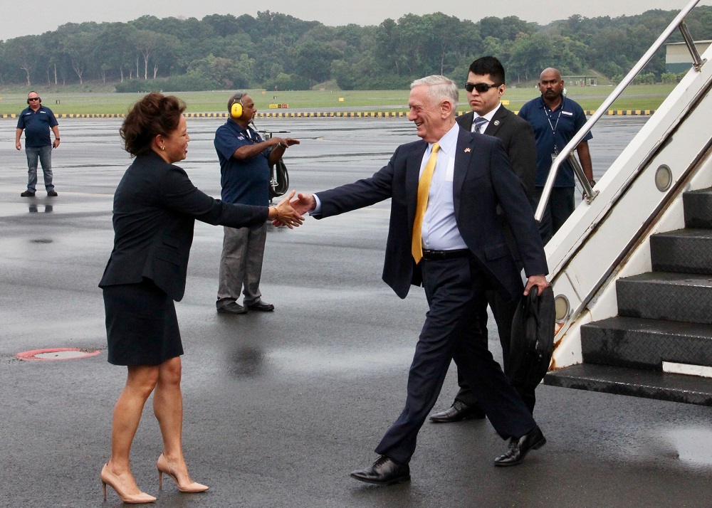 US Defence Secretary Jim Mattis shakes hands with an official upon his arrival in Singapore on October 17, 2018. u00e2u20acu201d AFP pic