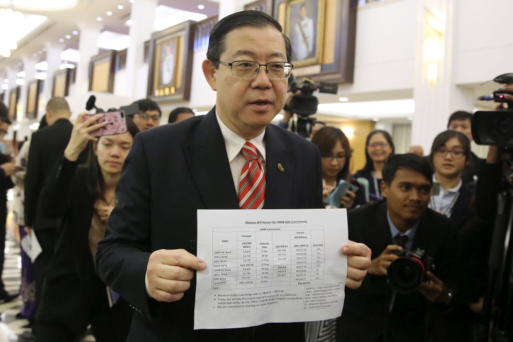 Finance Minister Lim Guan Eng speaks to reporters at Parliament in Kuala Lumpur October 18, 2018. u00e2u20acu201d Picture by Yusof Mat Isa