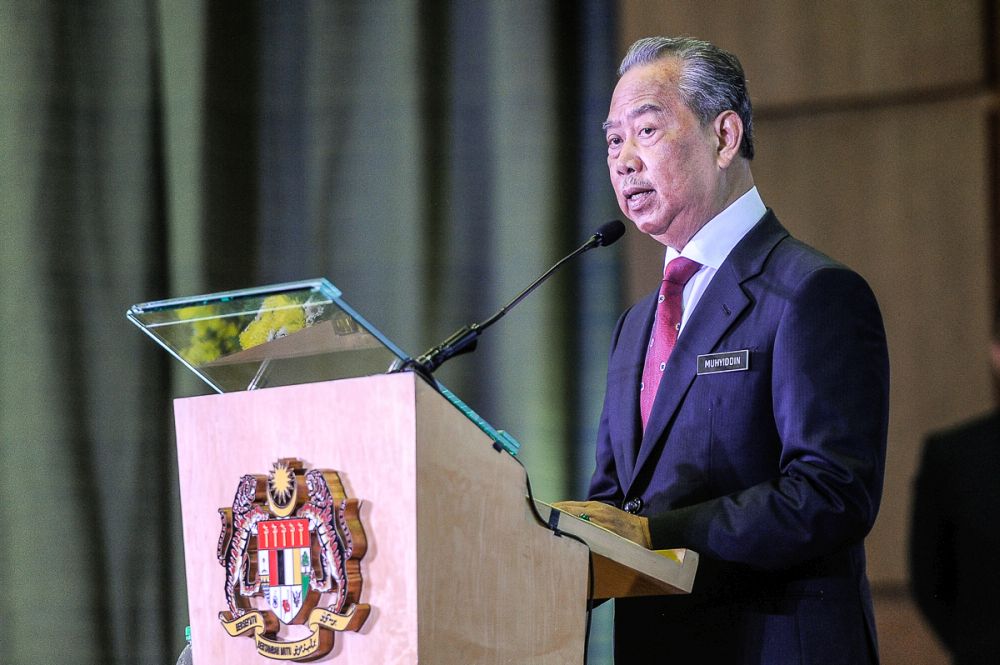 Tan Sri Muhyiddin Yassin speaks at the National Registration Department in Putrajaya October 25, 2018. u00e2u20acu201d Picture by Shafwan Zaidon