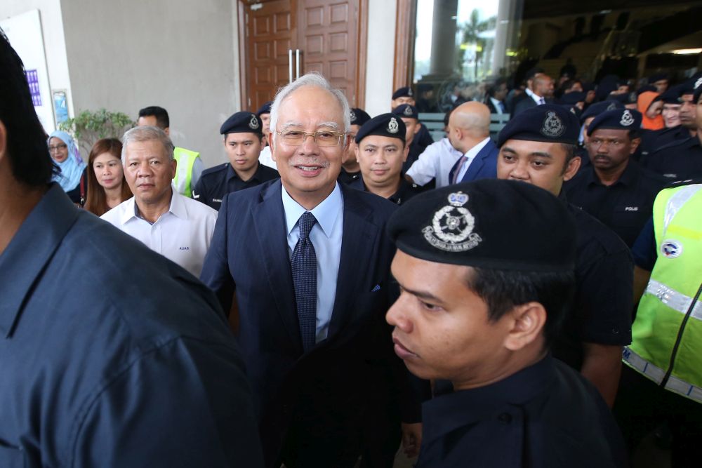 Datuk Seri Najib Razak leaves the Kuala Lumpur Court Complex October 4, 2018. u00e2u20acu2022 Picture by Azinuddin Ghazali