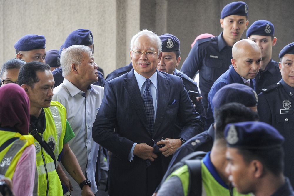 Datuk Seri Najib Razak arrives at the Kuala Lumpur High Court October 4, 2018. u00e2u20acu2022 Picture by Shafwan Zaidon