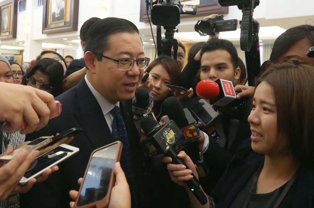 Lim Guan Eng speaks to reporters at Parliament in Kuala Lumpur October 25, 2018. u00e2u20acu201d Picture by Razak Ghazali