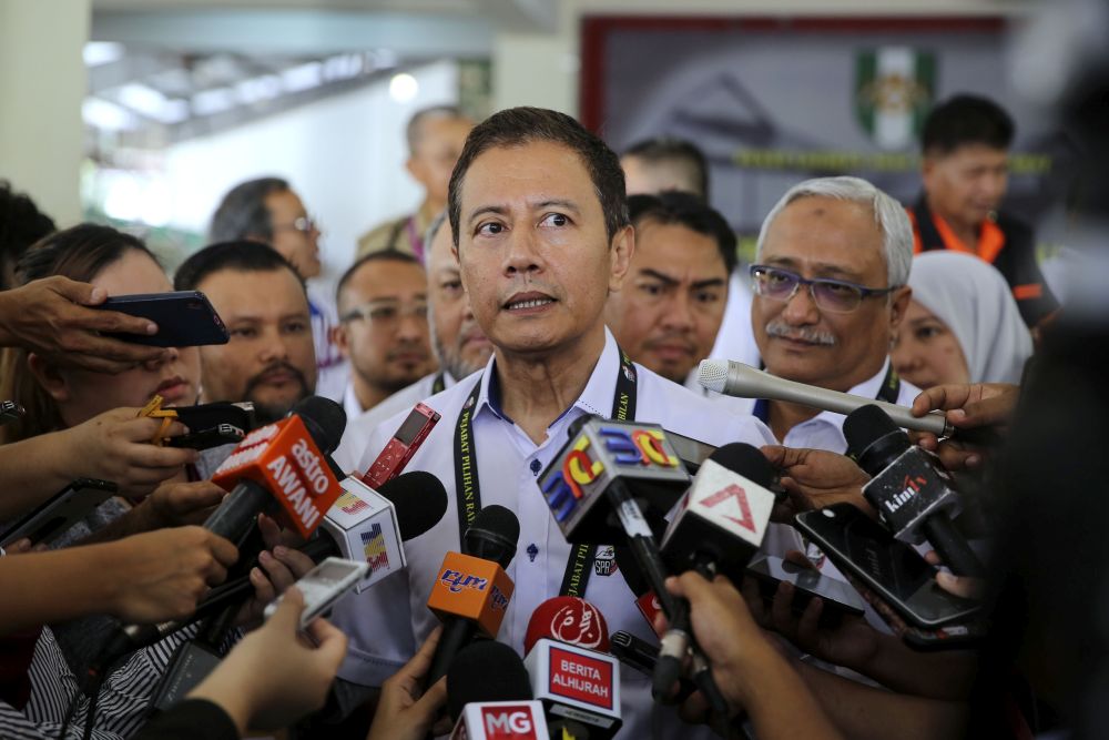 Election Commission chairman Azhar Harun speaks to media at Army Basic Training Centre in Port Dickson October 9, 2018. u00e2u20acu201d Picture by Yusof Mat Isa