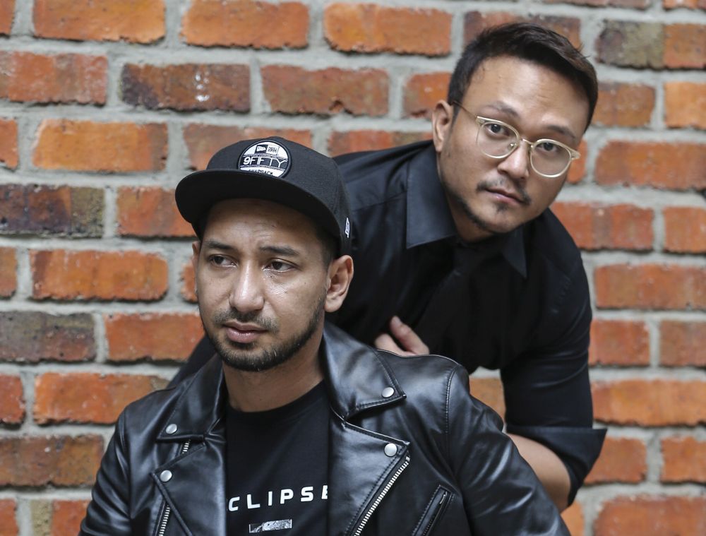 u00e2u20acu02dcPolis Evo 2u00e2u20acu2122 actors Zizan Razak (left) and Shaheizy Sam attend the filmu00e2u20acu2122s launch at The Gasket Alley in Petaling Jaya October 12, 2018.  u00e2u20acu201d Picture by Azneal Ishak