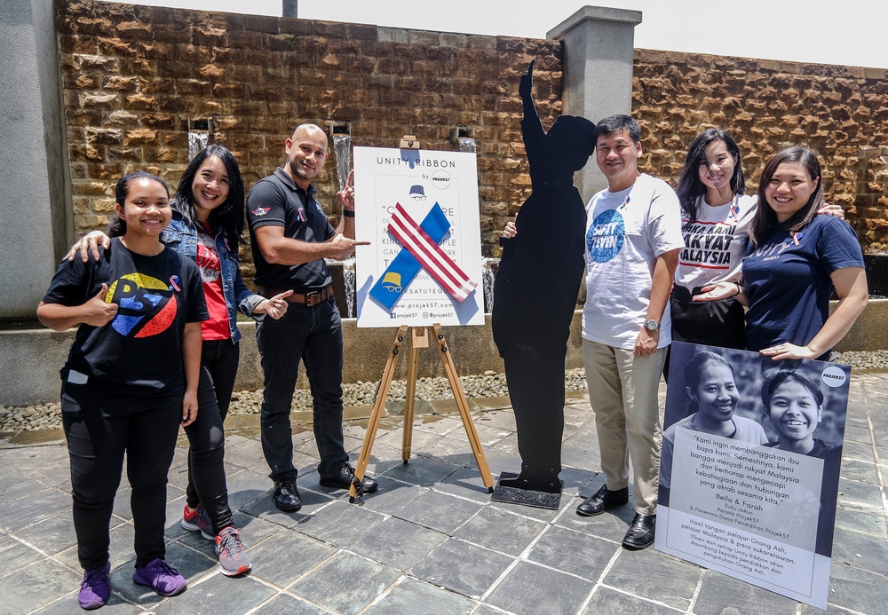 (From left) Jorita, Projek 57 executive director Debbie Choa, Syed Sadiq, Swee, marketing and communications executive Veronica Sin and accounts executive Grace Au Yong.  u00e2u20acu201d Picture by Firdaus Latif