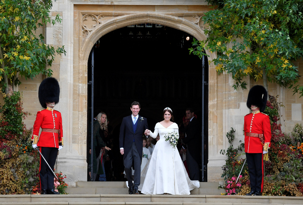 Britainu00e2u20acu2122s Princess Eugenie of York and her husband Jack Brooksbank leave after their wedding at St Georgeu00e2u20acu2122s Chapel in Windsor Castle, Windsor October 12, 2018. u00e2u20acu201d Reuters pic