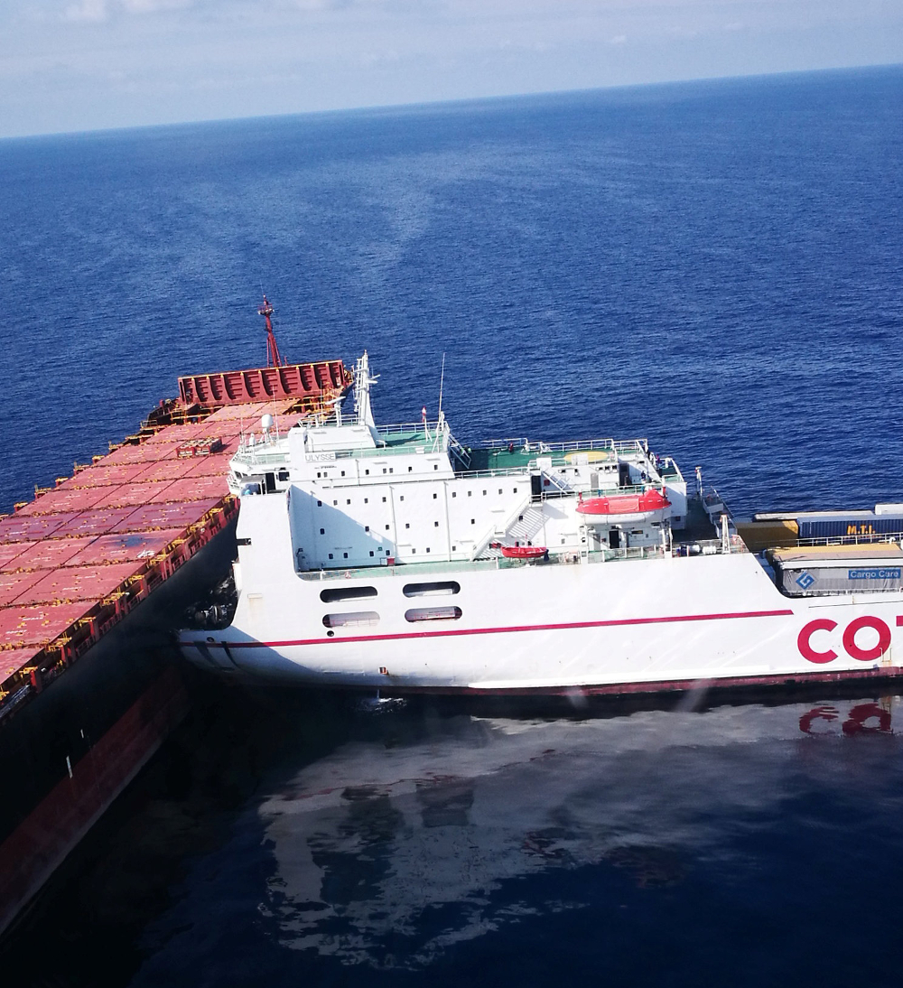 An aerial view shows the collision between the Tunisia roll-on/roll-off container ship Ulysses and the Cypriot container ship CLS Virginia that was at anchor off Corsica, October 7, 2018. u00e2u20acu201d Picture by Gendarmerie Nationale via Reuters
