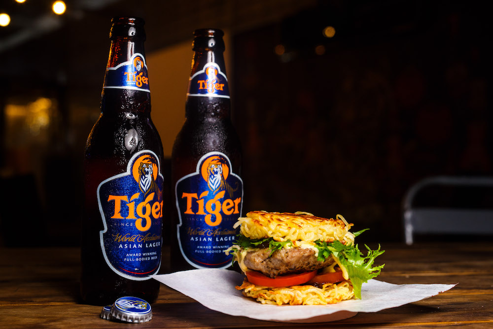 Jun Chan's Ramen Burger with Tiger and Cheddar Sauce. 