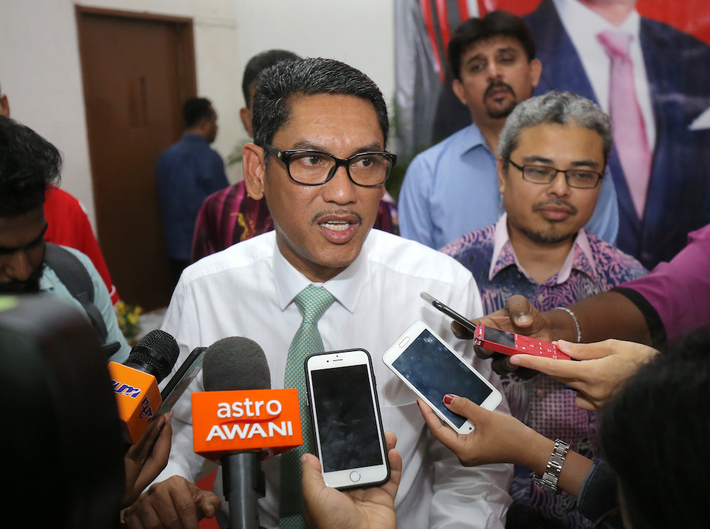 Perak Mentri Besar Datuk Seri Ahmad Faizal Azumu speaks to the media after the handing over of renewed land grants to residents in Menglembu November 15, 2018. u00e2u20acu201d Picture by Marcus Pheong