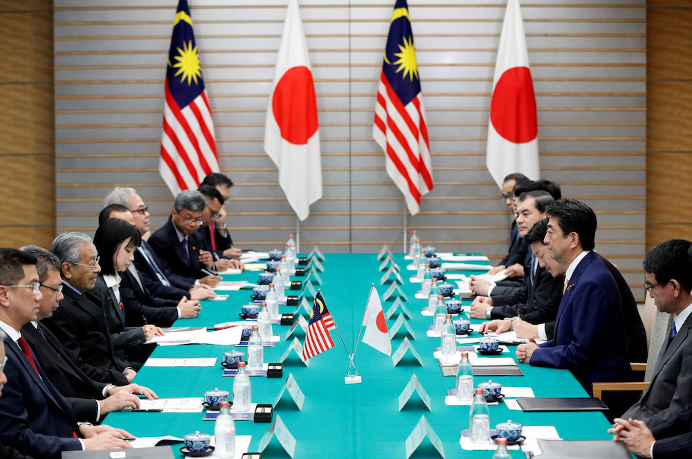 Prime Minister Tun Dr Mahathir Mohamad talks with Japanu00e2u20acu2122s Prime Minister Shinzo Abe during their meeting at Abeu00e2u20acu2122s official residence in Tokyo November 6, 2018. u00e2u20acu201d Reuters pic