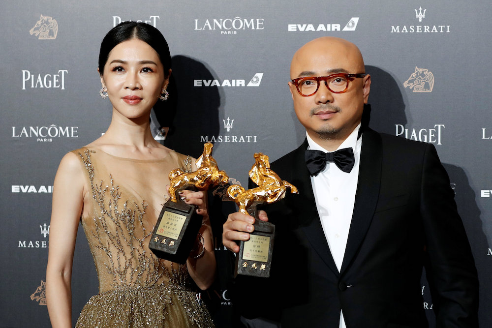 Actors Hsieh Ying-xuan and Xu Zheng pose after winning the awards for Best Leading Actress and Best Leading Actor at the 55th Golden Horse Awards in Taipei November 18, 2018. — Reuters pic