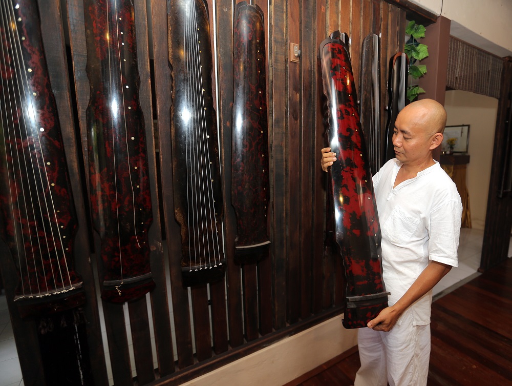 Since starting his hobby, Ng Chung Sing has made over 30 Guqin. u00e2u20acu201d Picture by Farhan Najib 