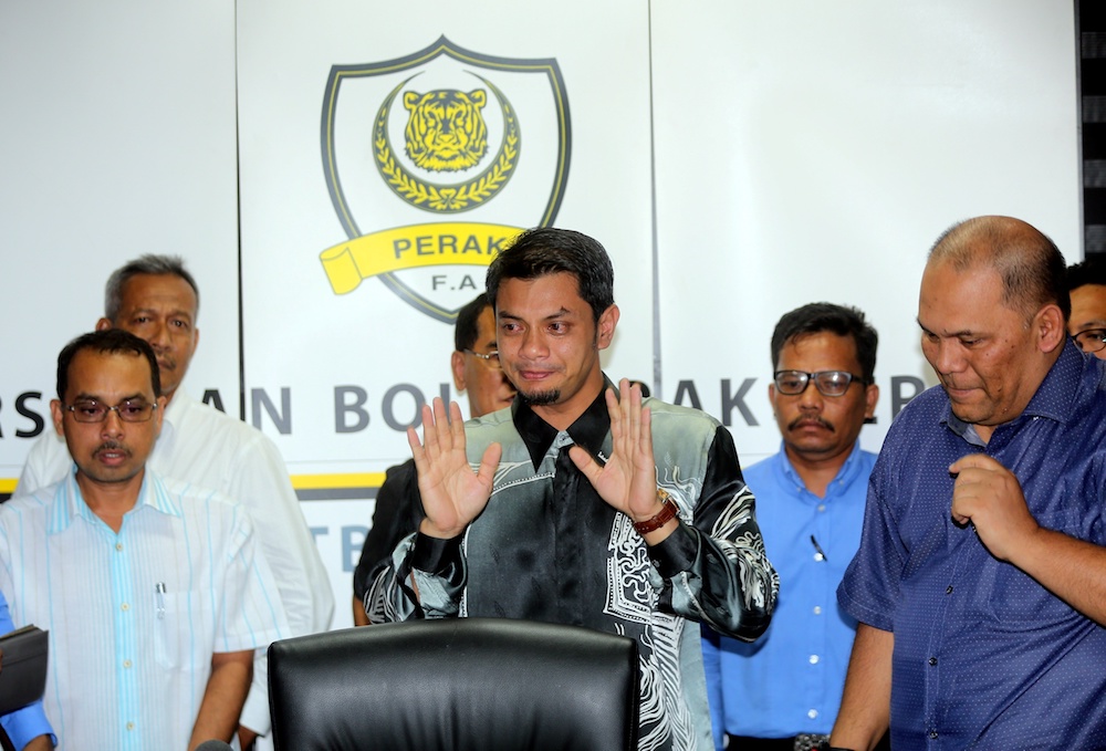 Hasnul Zulkarnain Abdul Munaim announces his resignation as president of the Perak Football Association in Ipoh November 8, 2018. u00e2u20acu201d Picture by Farhan Najib