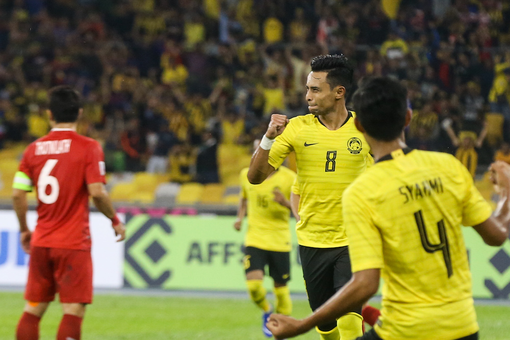 Malaysia’s Mohamad Zaquan Adha celebrates his equaliser goal during the AFF Suzuki Cup group A match against Laos in Kuala Lumpur November 12,2018. — Picture by Ahmad Zamzahuri