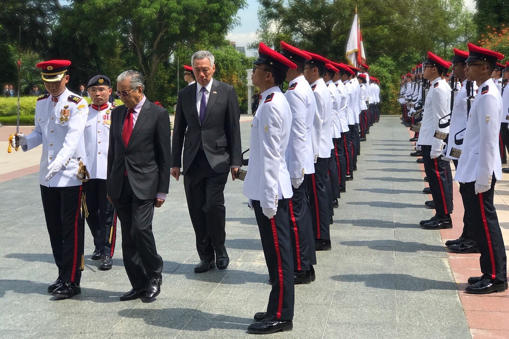 Prime Minister Tun Dr Mahathir Mohamad and Singapore Prime Minister Lee Hsien Loong inspecting the honour guard at The Istana in Singapore November 12, 2018. u00e2u20acu201d Picture by Zurairi AR
